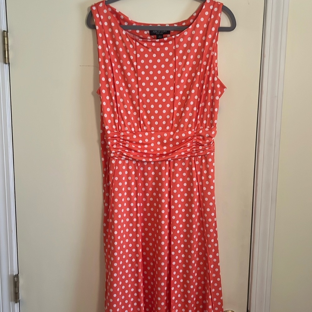 Beautiful sleeveless orange dress with white polka dots